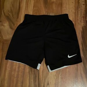 Nike standard fit soccer shorts, girls size S.